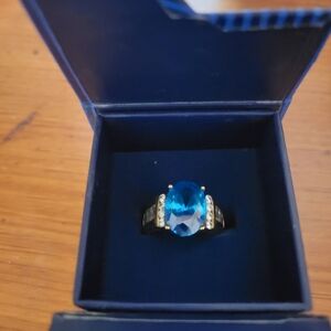 Elegant Blue Topaz Gemstone Ring With Simulated Diamonds